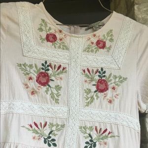 Cream colored dress.